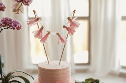 diy tassel garland cake topper