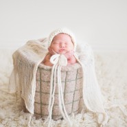 newborn baby girl session with baskets and wool fillers